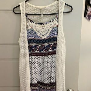 Swing dress with a cardigan on top.
